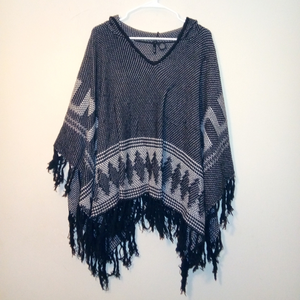 Knitted poncho with hood